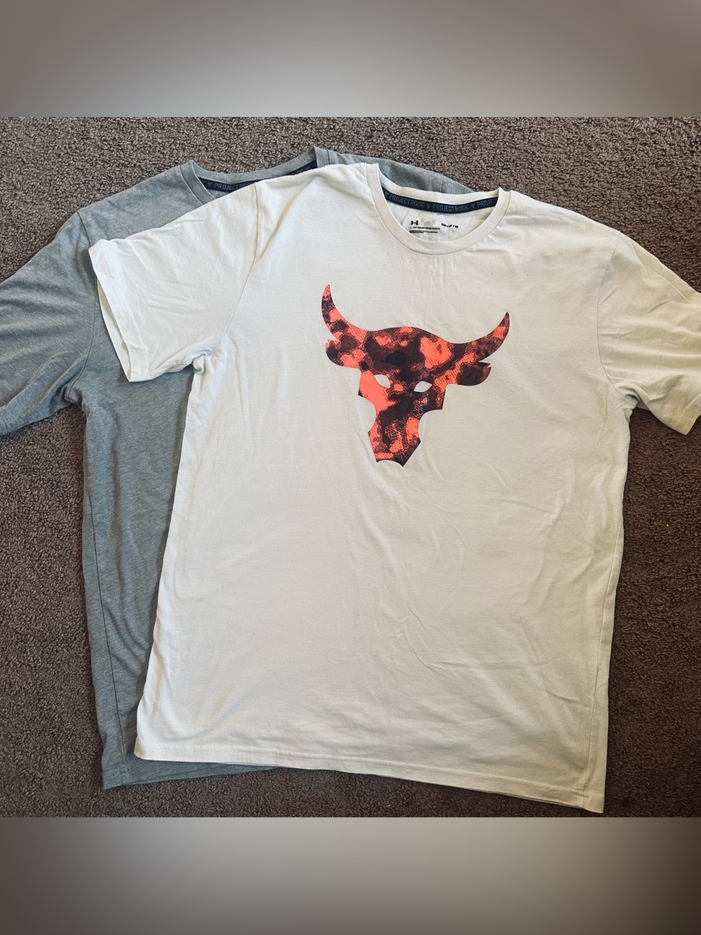 Under Armour Men’s White Graphic Short-Sleeve Tee - Project Rock (2) shirts